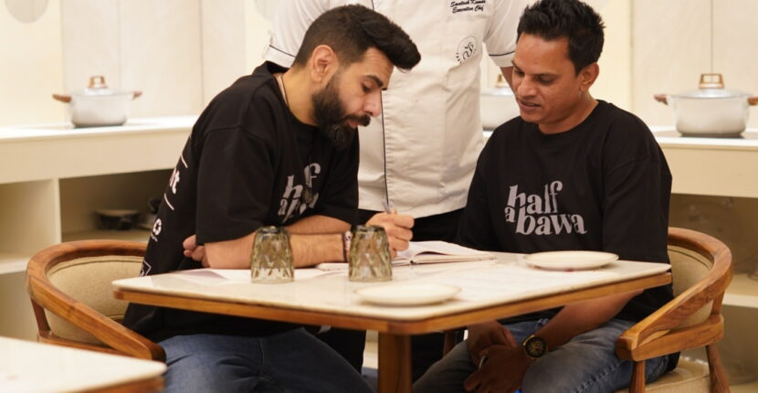 A hospitality consultant reviewing a restaurant's operations with the owner